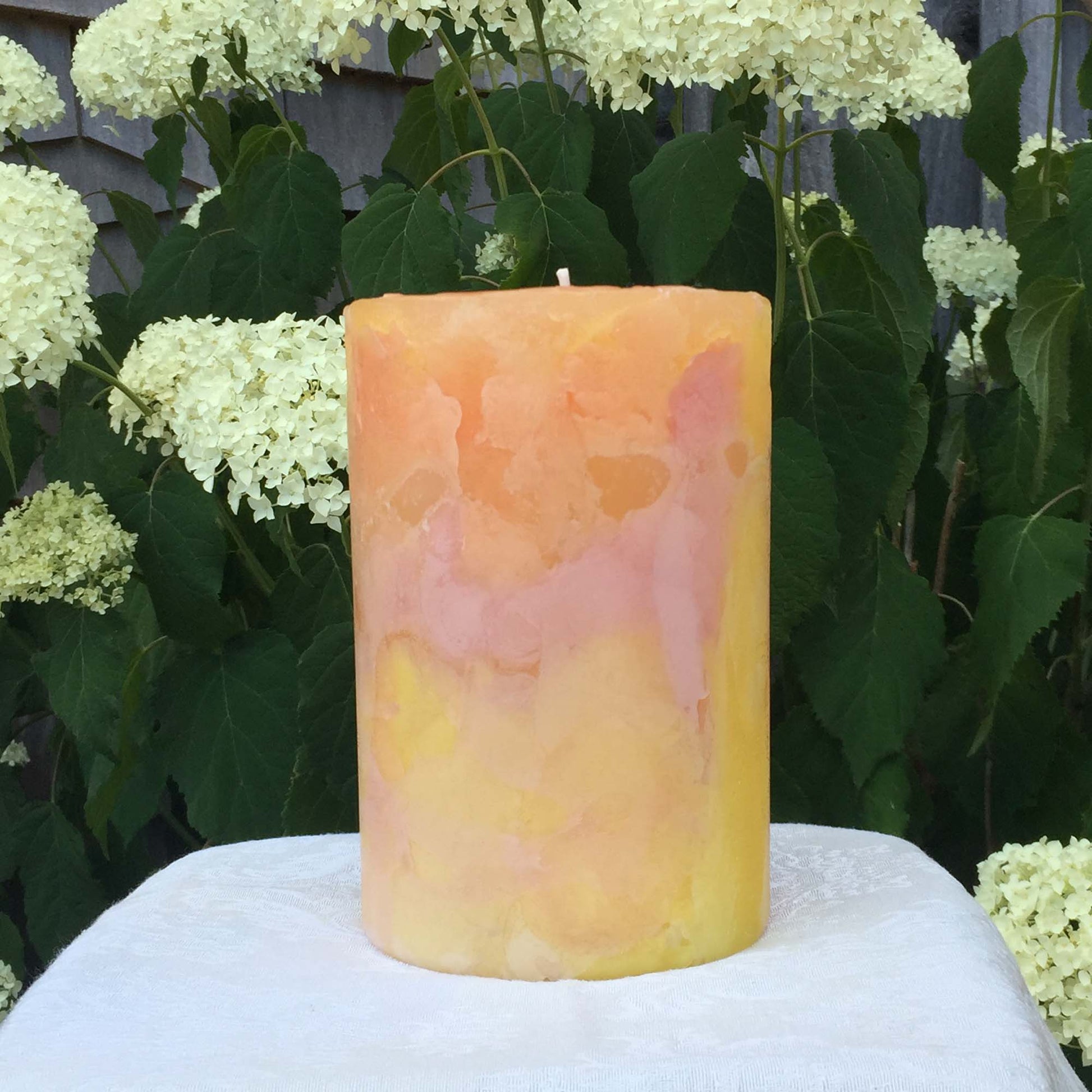 Orange, Yellow n Fuschia Climate Change pillar candle - Fanny Bay Candle Company