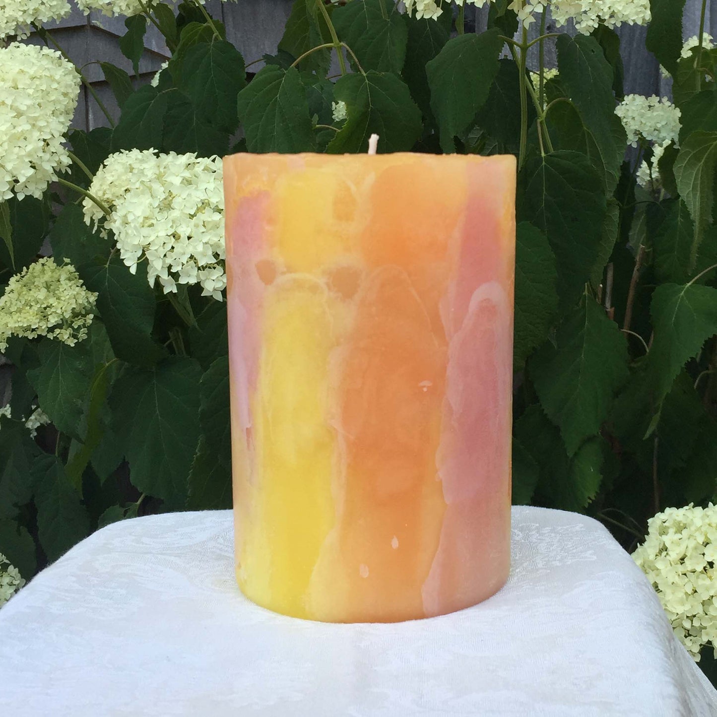 Orange, Yellow n Fuschia Climate Change pillar candle - Fanny Bay Candle Company